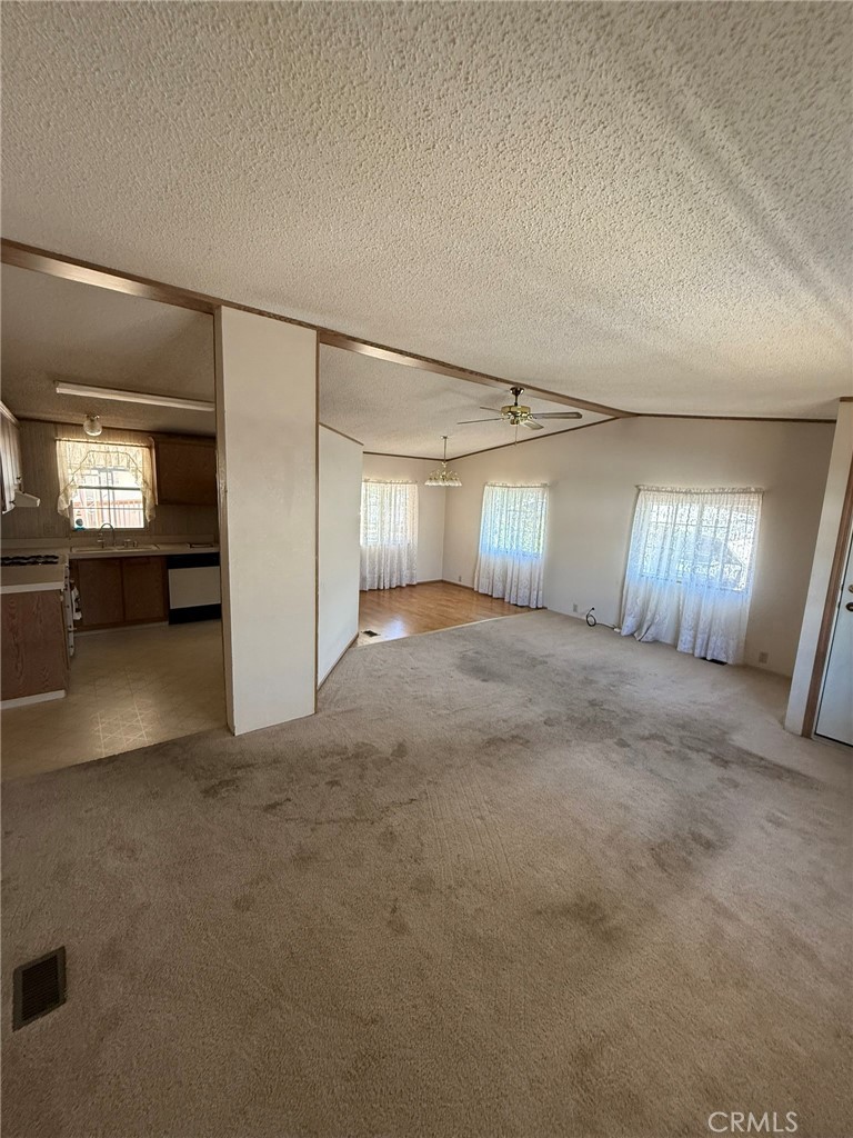 2658 Brougham Drive Oroville, CA 95966 - Photo 8 of 23 an empty room with a empty space and windows
