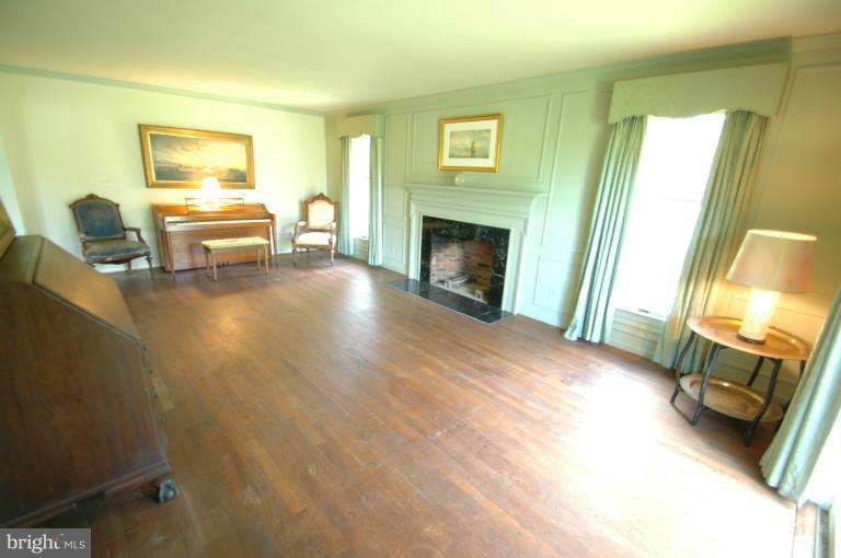 1720 Pleasant Plains Road Annapolis, MD 21409 - Photo 22 of 27 Living Room with lovely fireplace