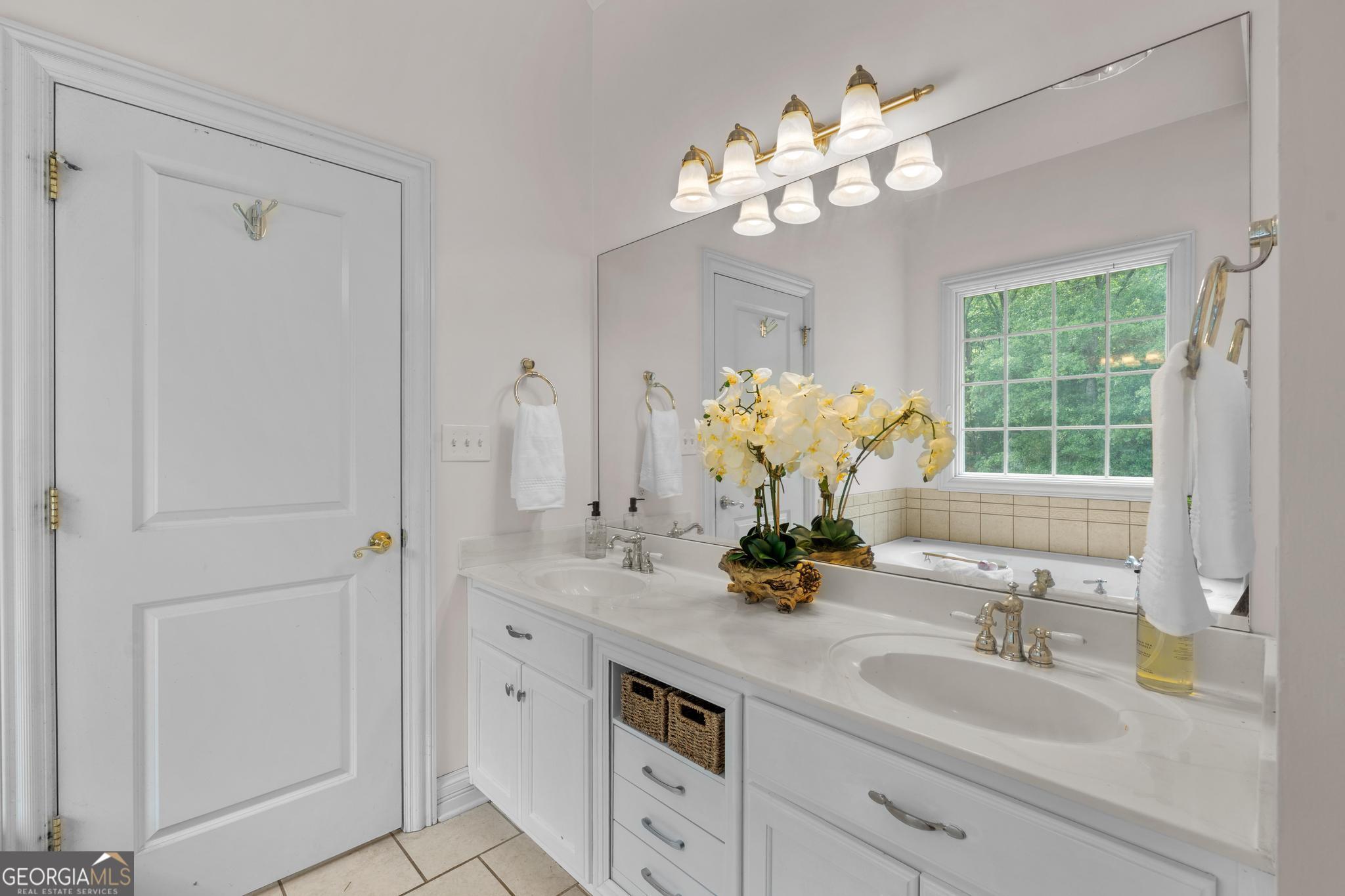 155 Rocky Way Williamson, GA 30292 - Photo 13 of 47 a bathroom with a sink vanity and a mirror