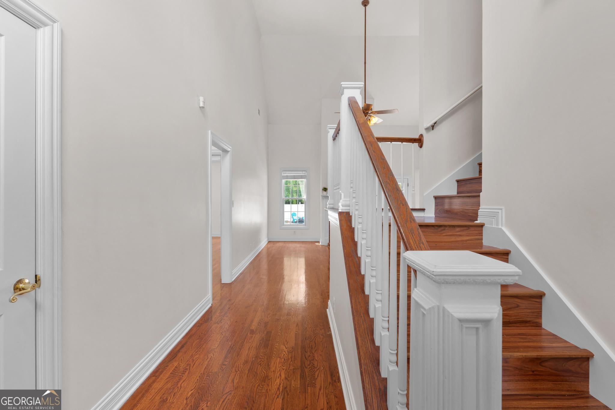 155 Rocky Way Williamson, GA 30292 - Photo 23 of 47 a view of entryway and hall with wooden floor