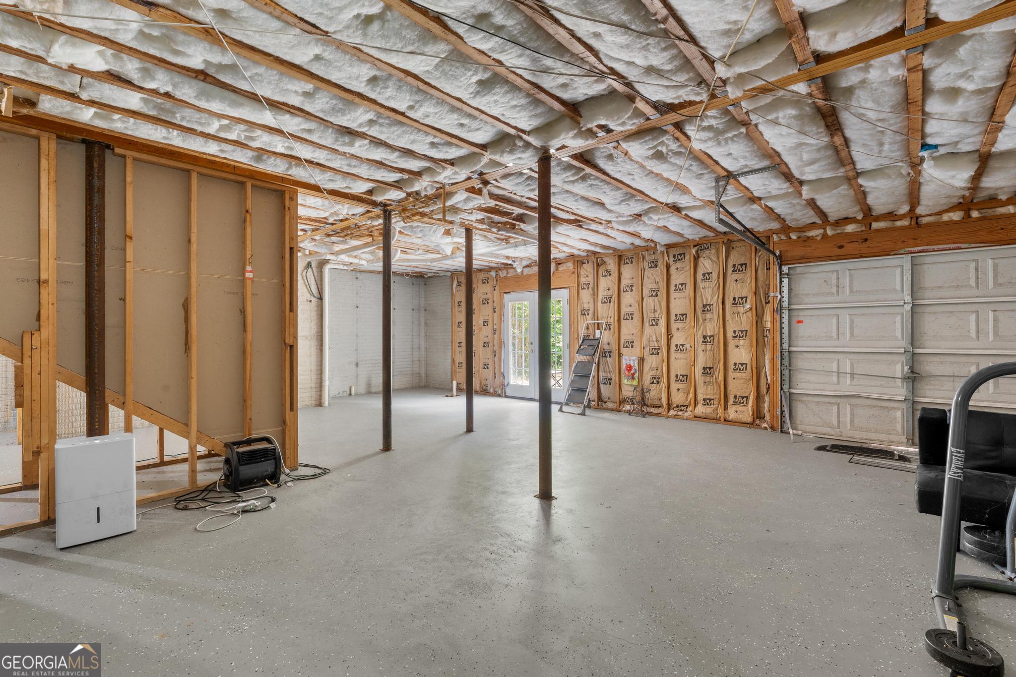 155 Rocky Way Williamson, GA 30292 - Photo 37 of 47 a view of a room with gym equipment