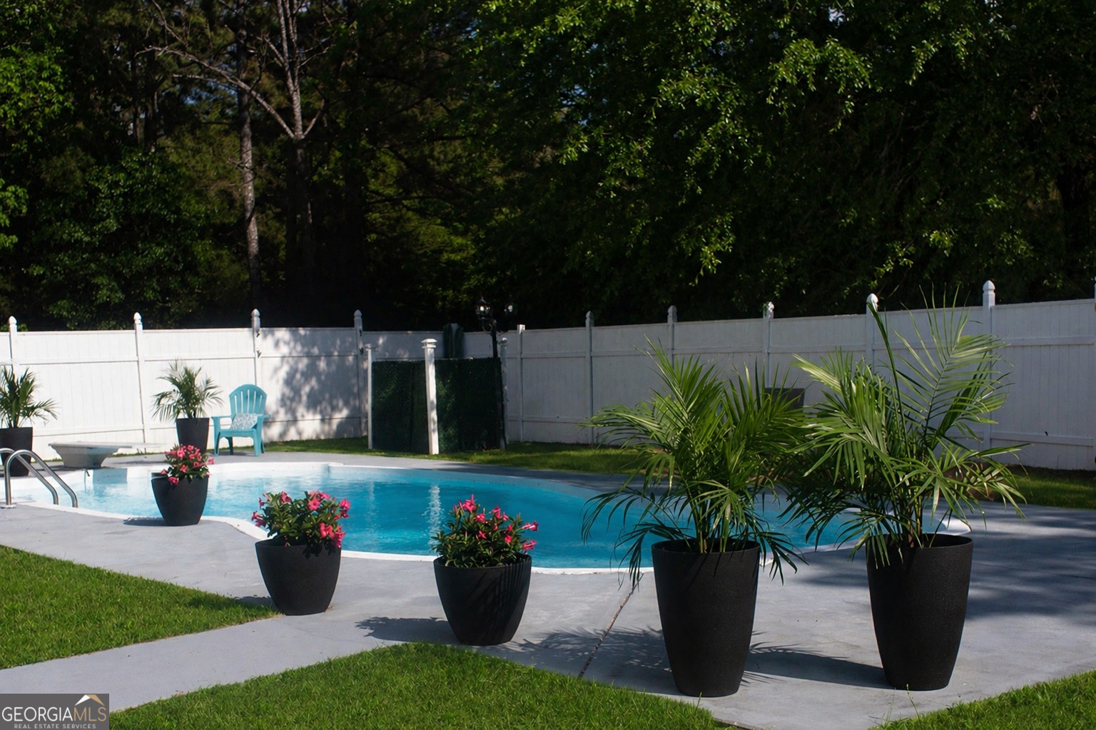 155 Rocky Way Williamson, GA 30292 - Photo 43 of 47 a view of a backyard with plants and trees