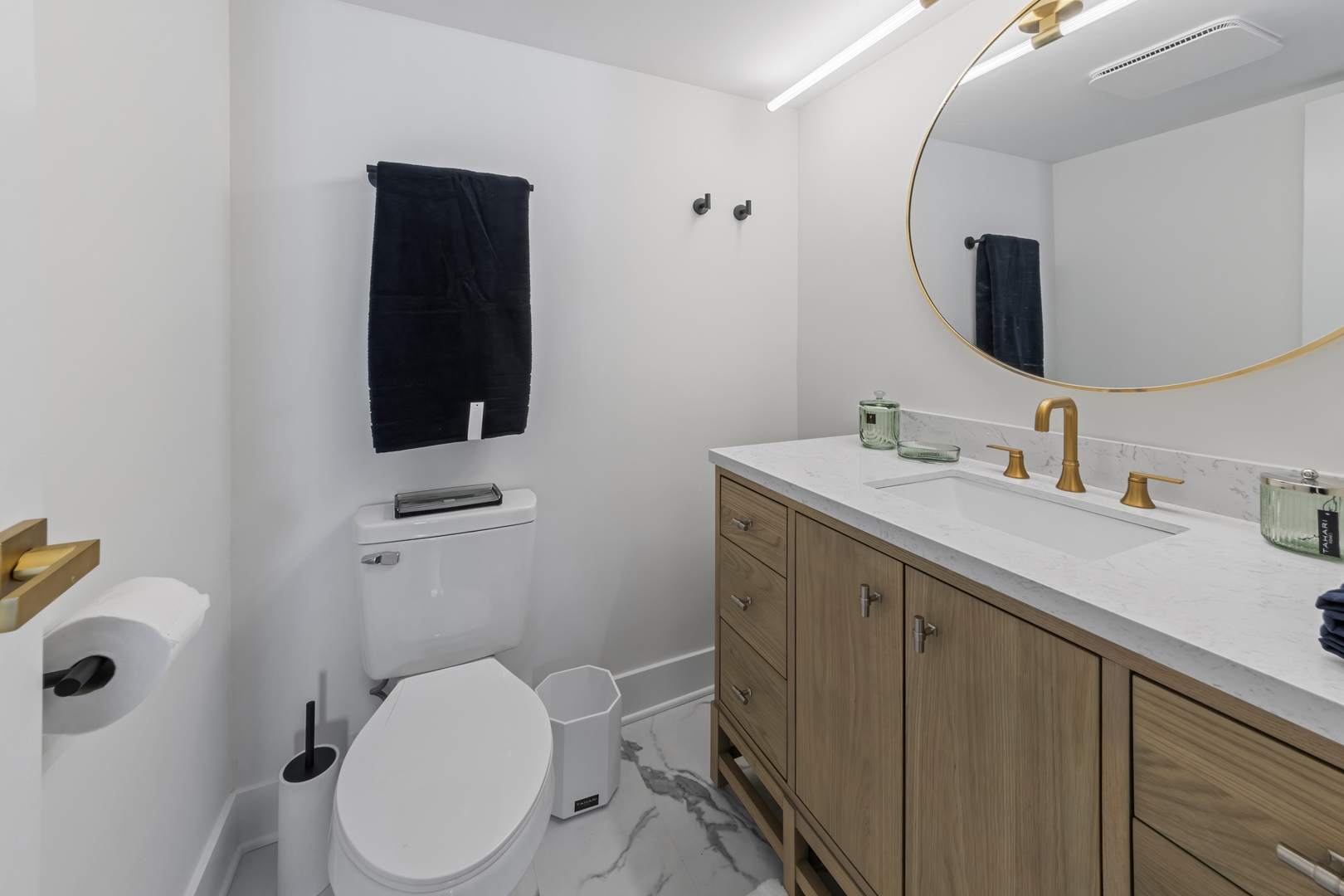 830 Elder Road, Unit B104 Homewood, IL 60430 - Photo 12 of 19 a bathroom with a toilet sink and mirror