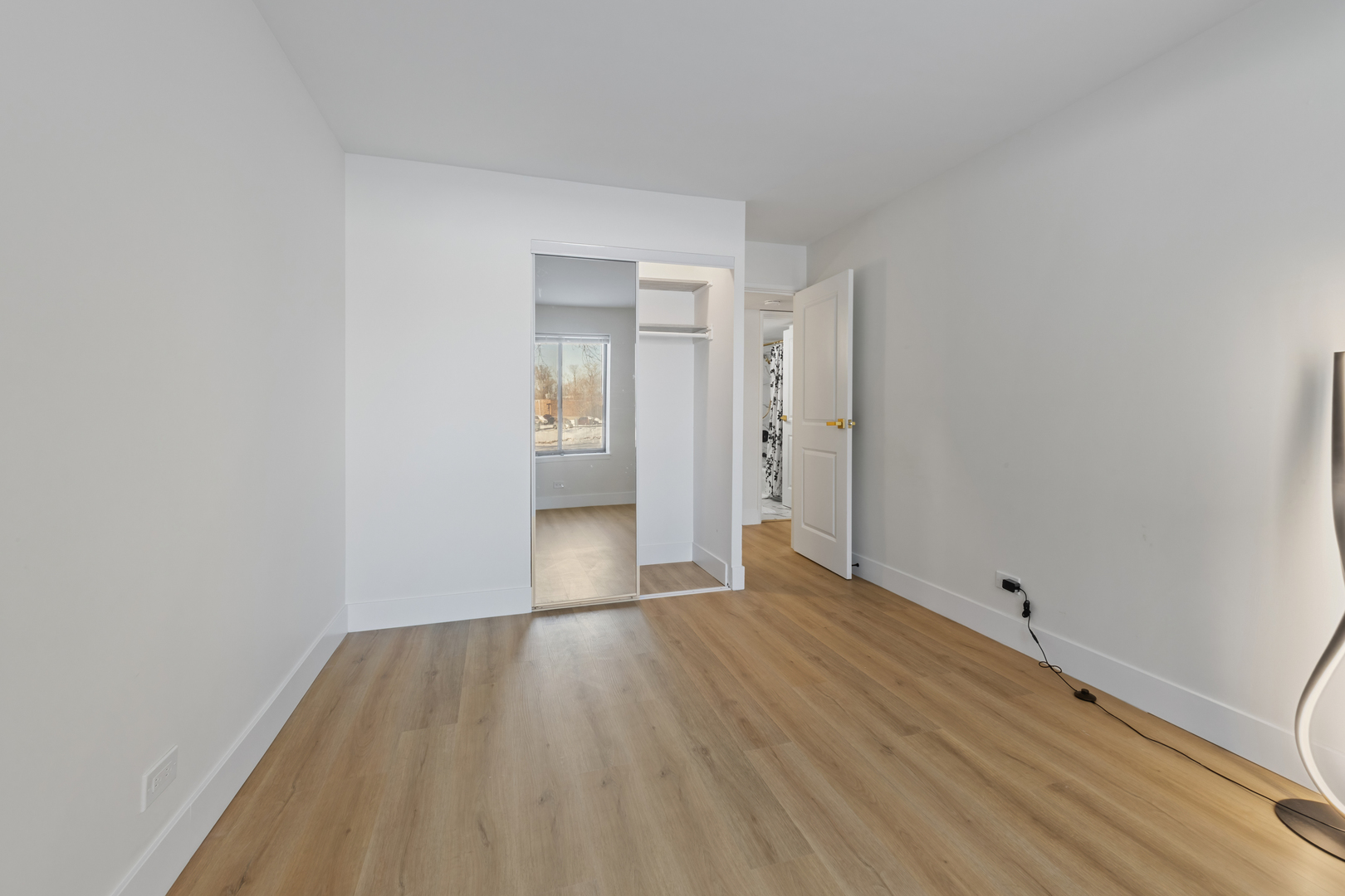 830 Elder Road, Unit B104 Homewood, IL 60430 - Photo 16 of 19 a view of wooden floor in an empty room
