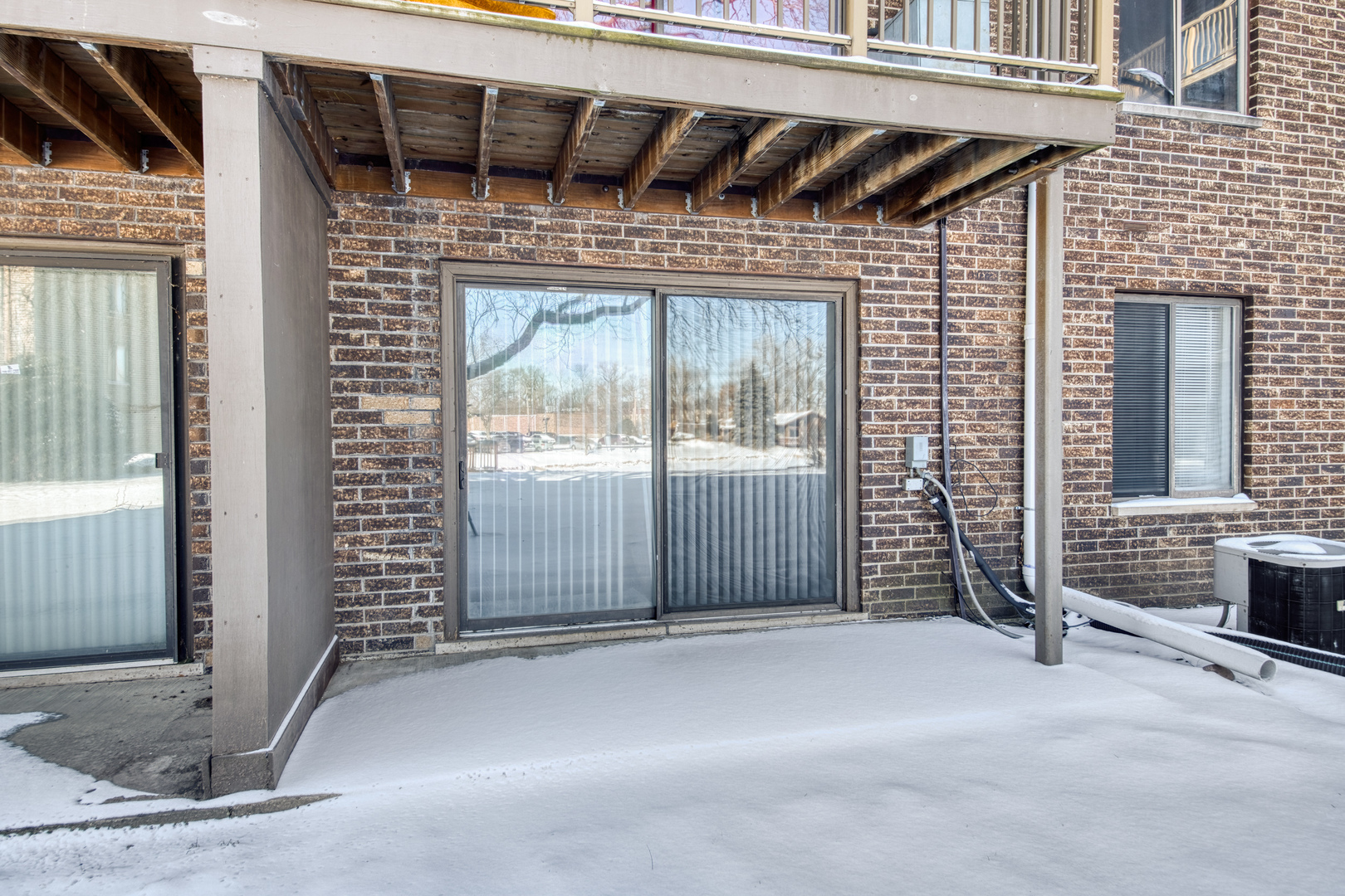 830 Elder Road, Unit B104 Homewood, IL 60430 - Photo 19 of 19 a view of outdoor space garage and window