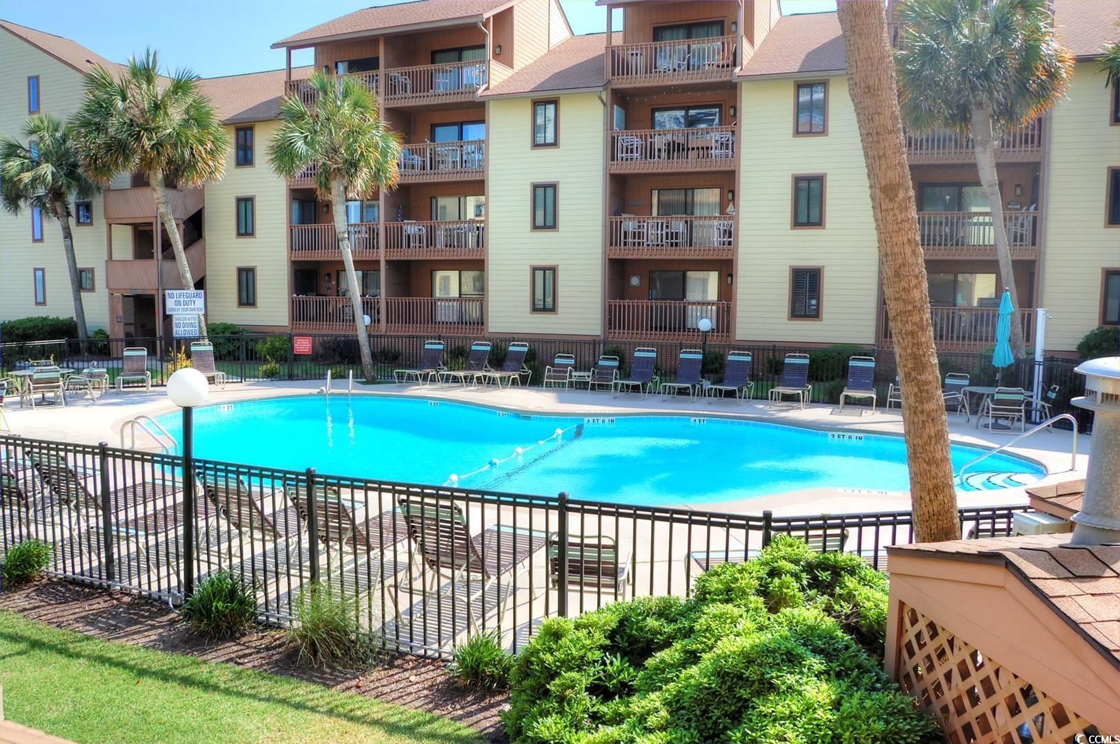 5507 North Ocean Boulevard, Unit 113 Myrtle Beach, SC 29577 - Photo 17 of 28 View of community pool