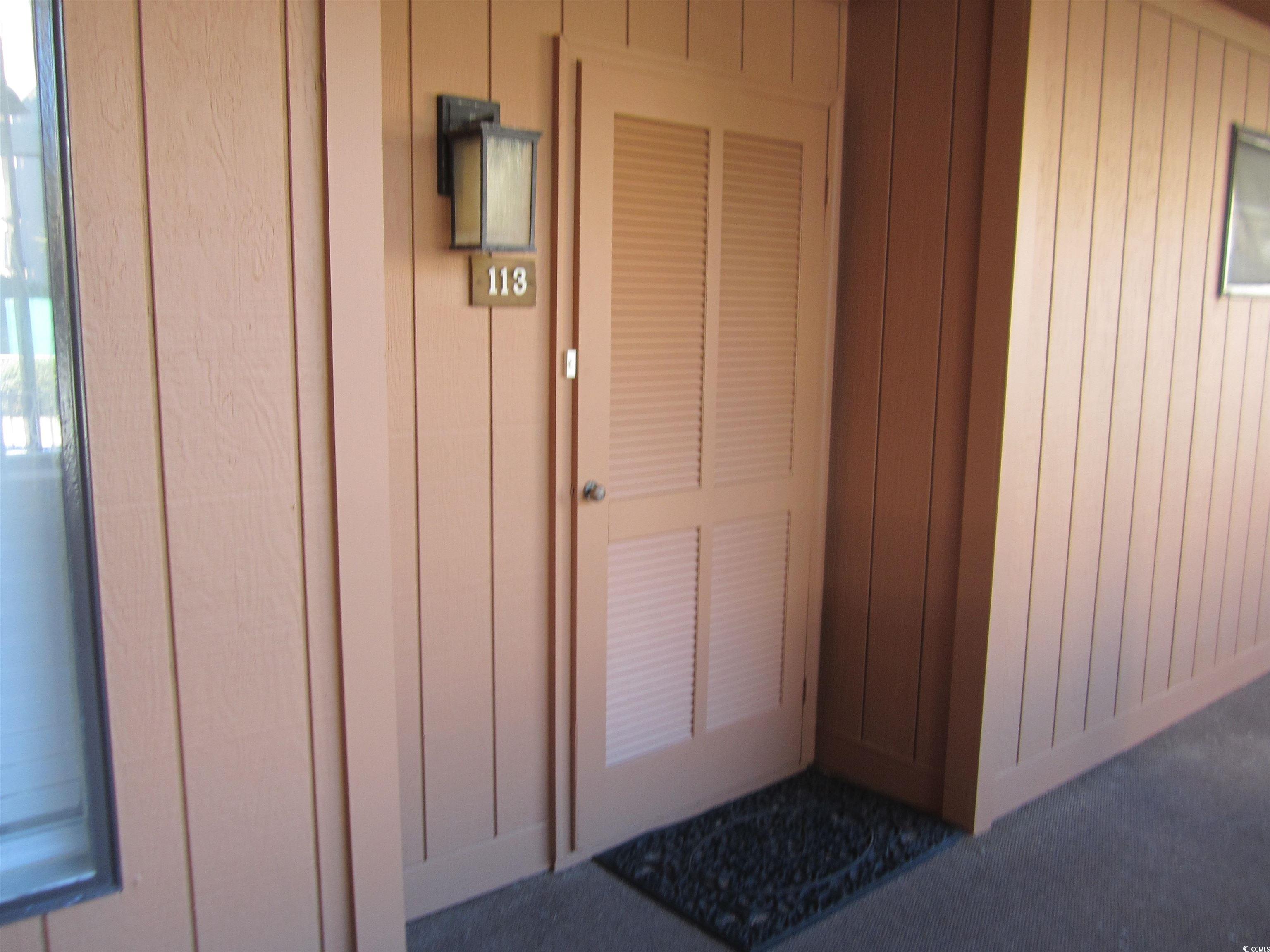 5507 North Ocean Boulevard, Unit 113 Myrtle Beach, SC 29577 - Photo 23 of 28 Property entrance