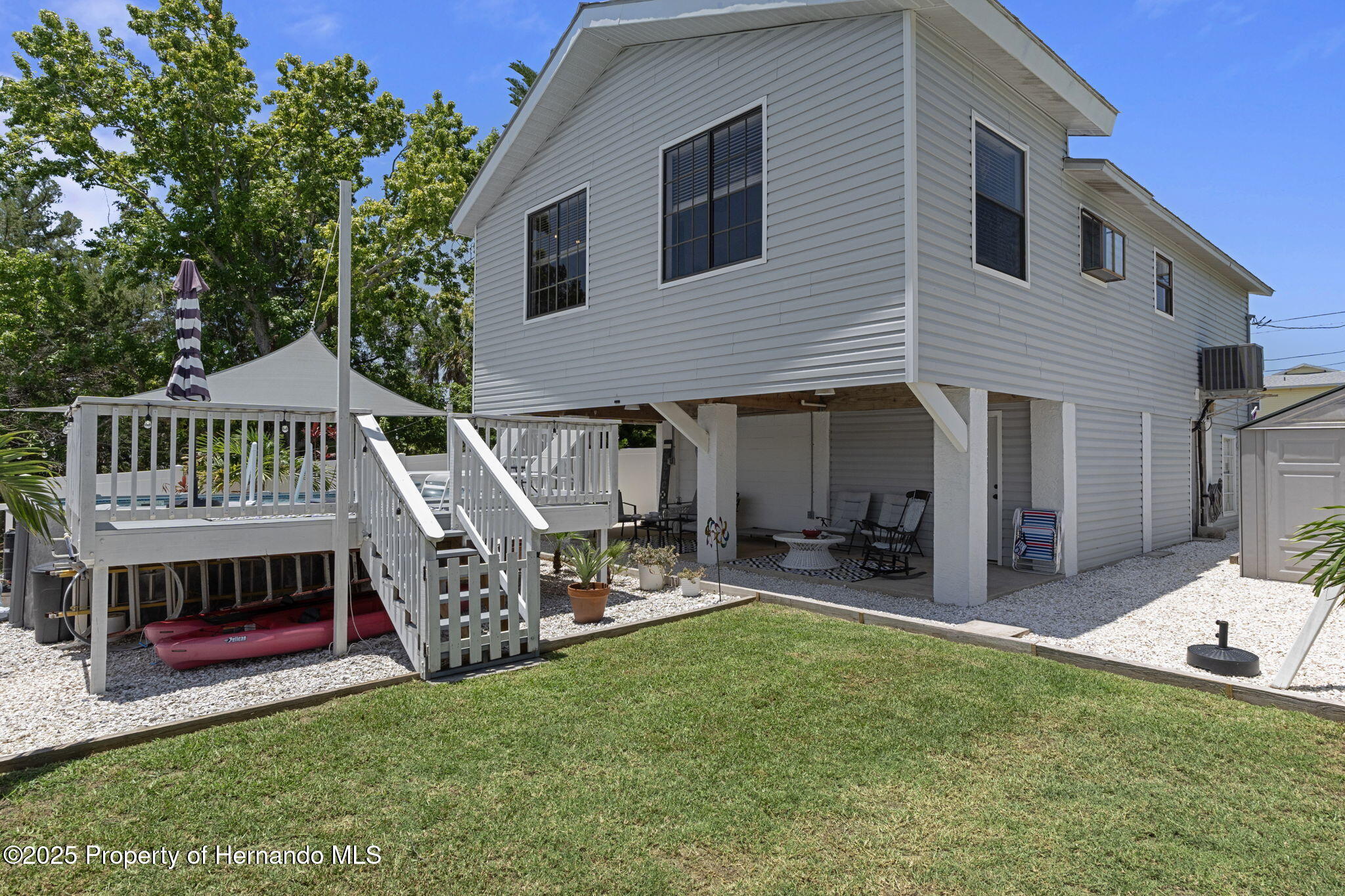 3216 Sea Grape Drive Hernando Beach, FL 34607 - Photo 27 of 39 Porch & Pool