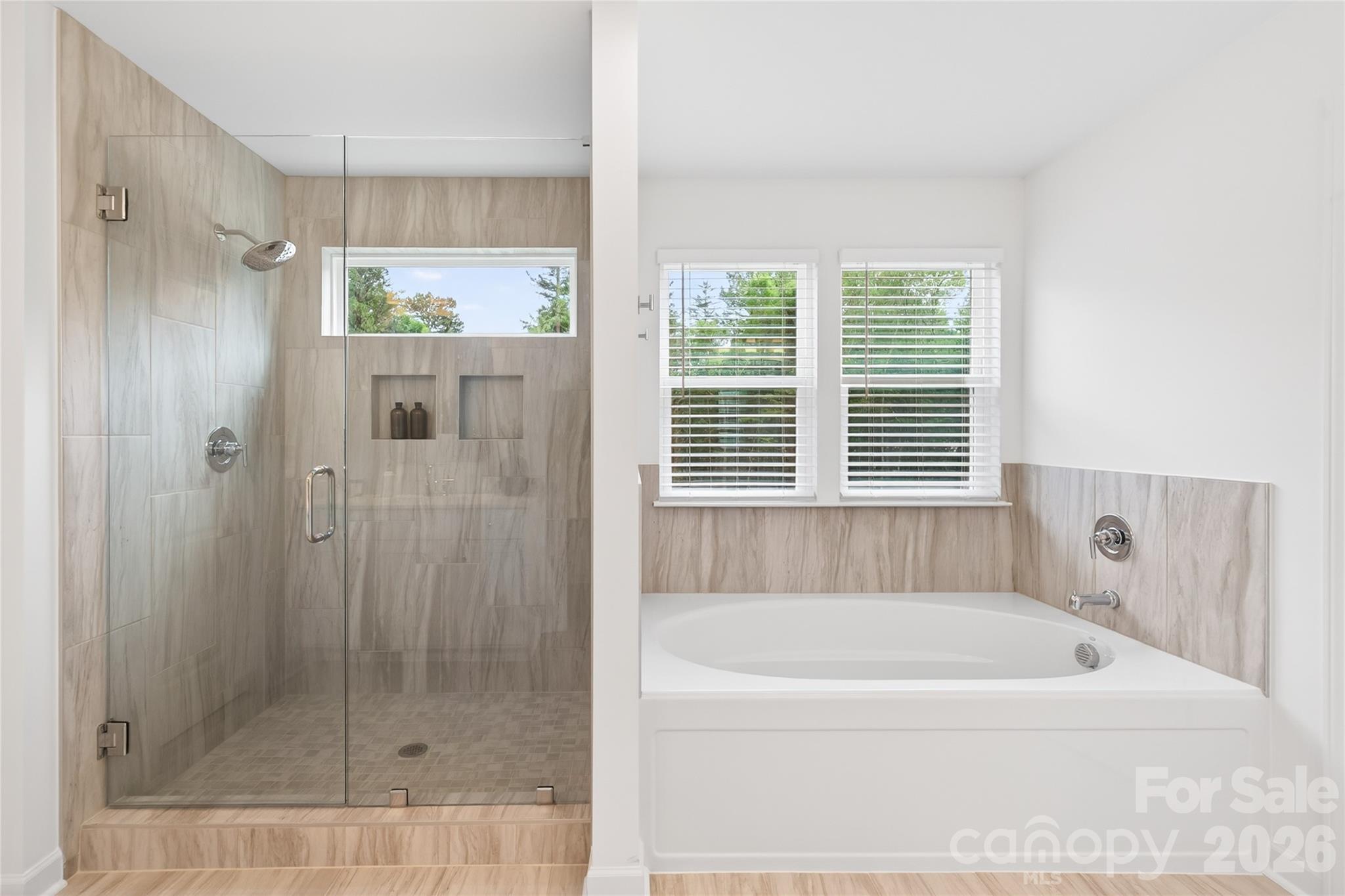 128 Overcash Road, Unit 7171 Troutman, NC 28166 - Photo 23 of 41 a bathroom with a bathtub and shower
