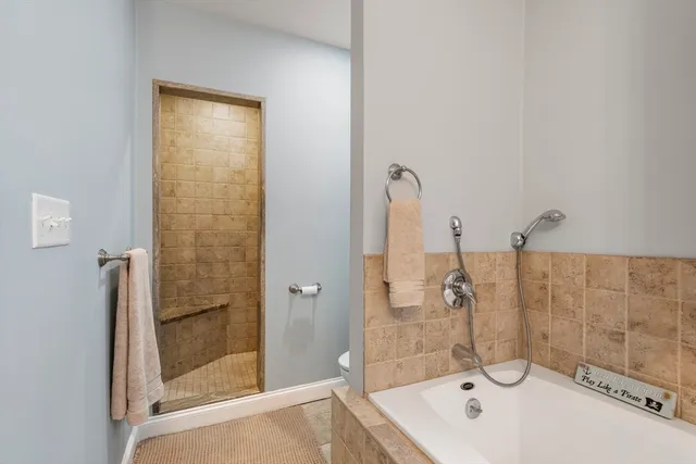 a bathroom with a sink and a shower