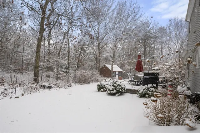 a view of snow on the side of road