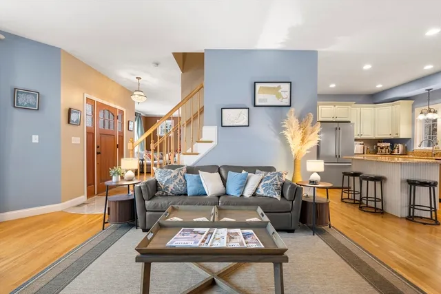 a living room with furniture and a table