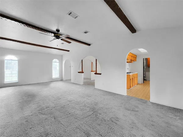 a view of a livingroom with a staircase