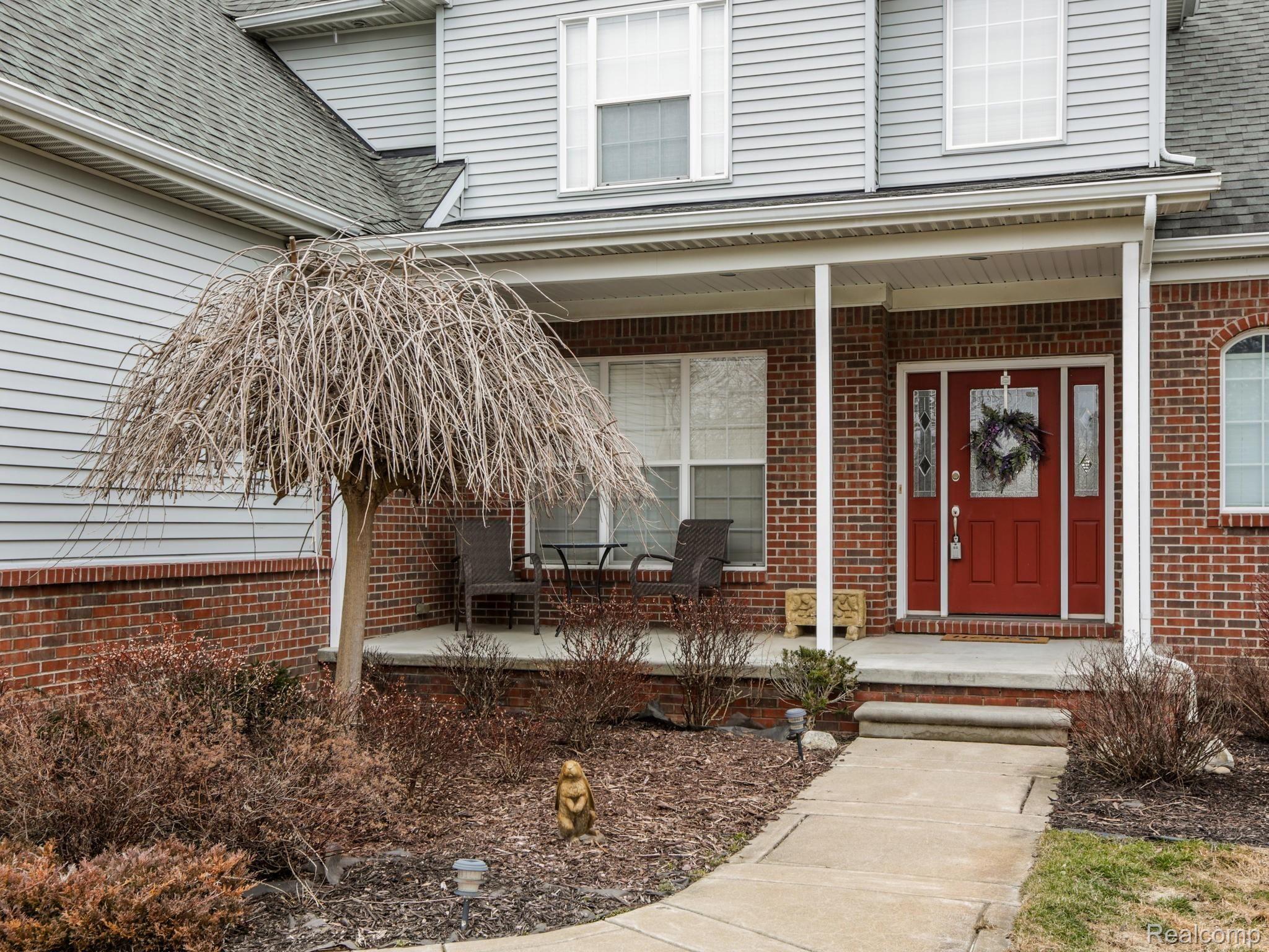 The covered front porch will welcome your friends and family to your home.