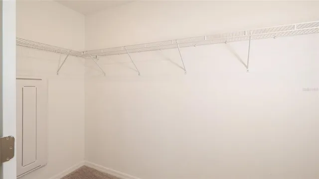 a view of a room with racks on the wall