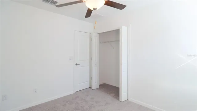 a view of a bathroom from the hallway