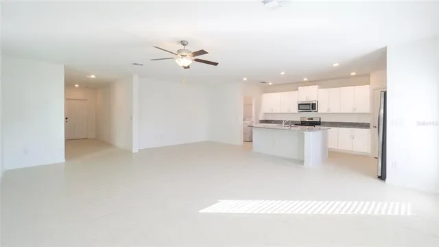 a view of a kitchen with a sink