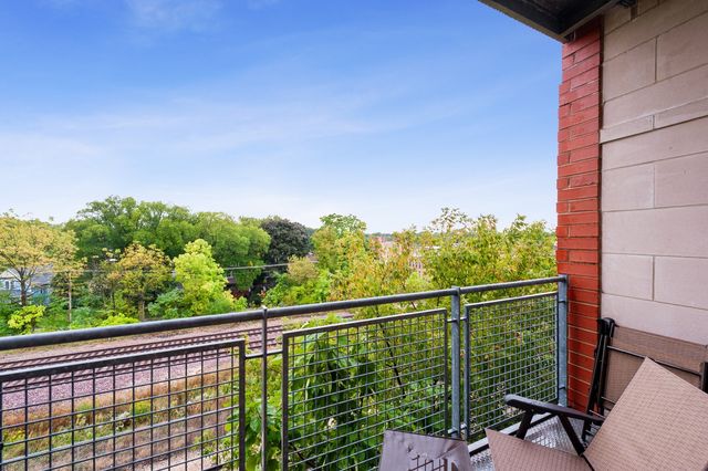 a view of a balcony with an outdoor space