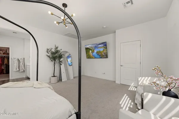 a bathroom with a double vanity sink and mirror