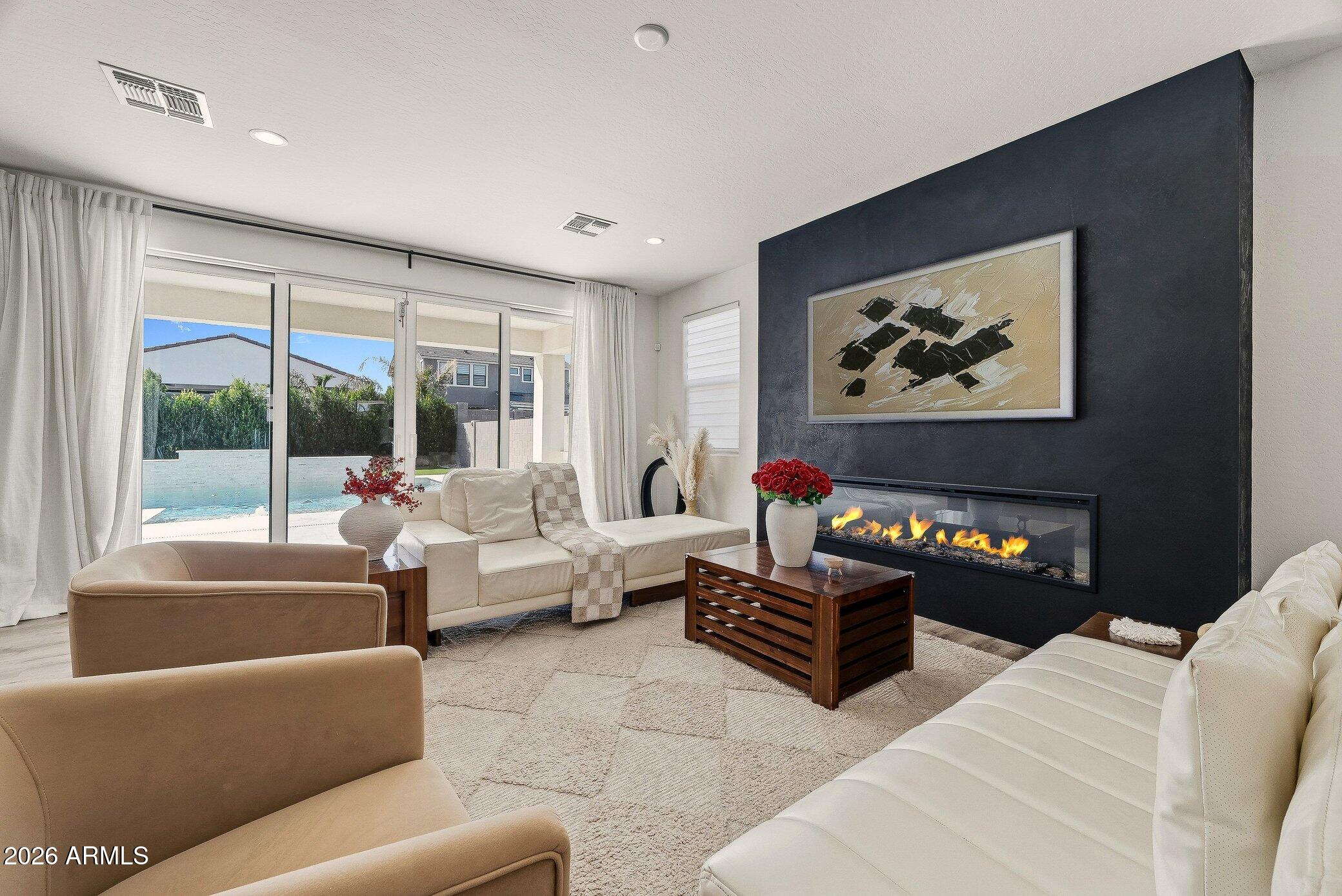 35032 North Barrel Road Queen Creek, AZ 85144 - Photo 22 of 40 a living room with furniture and a large window
