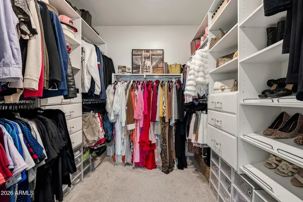 a view of hallway with wooden floor