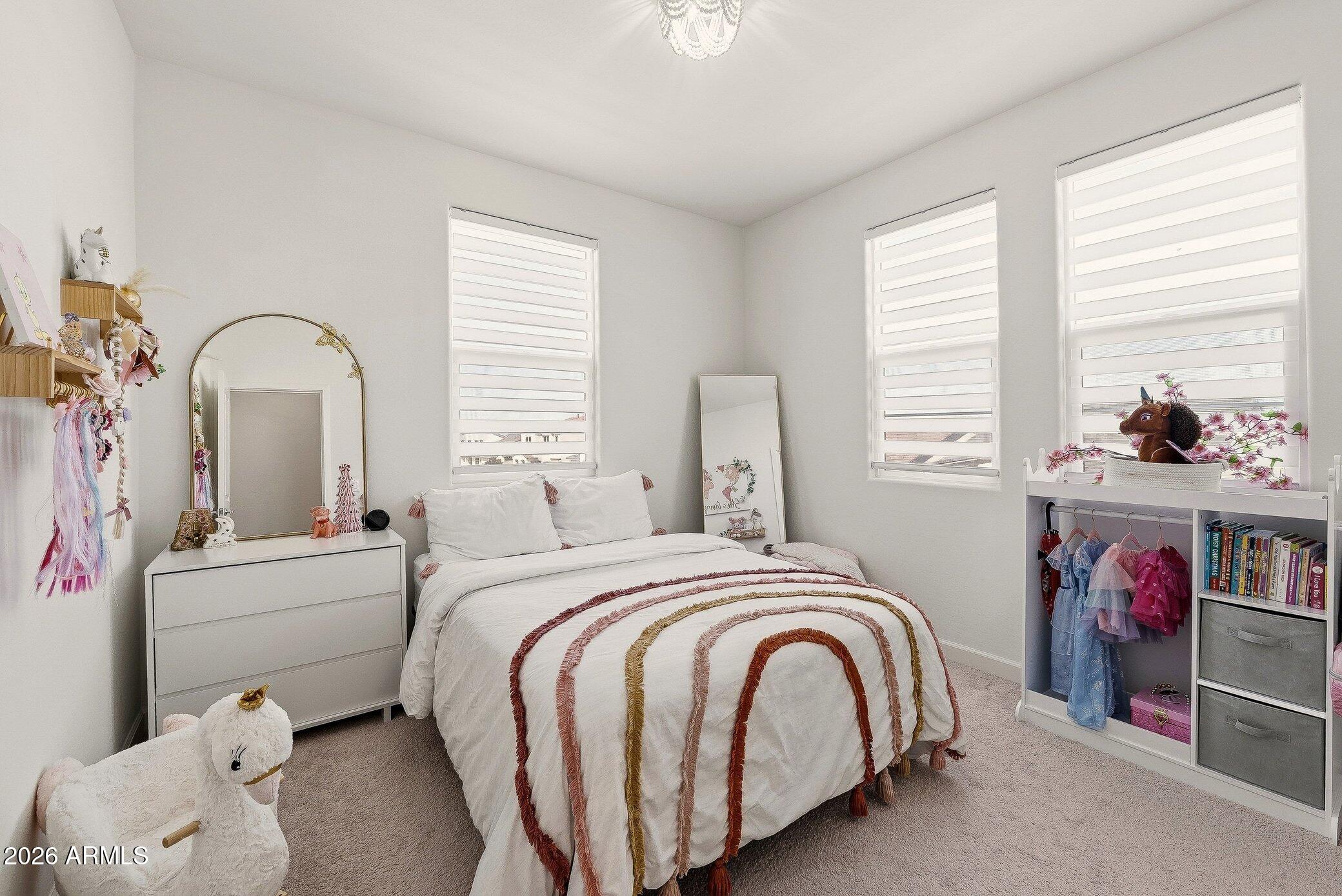 35032 North Barrel Road Queen Creek, AZ 85144 - Photo 31 of 40 a bed room with a bed and a large window