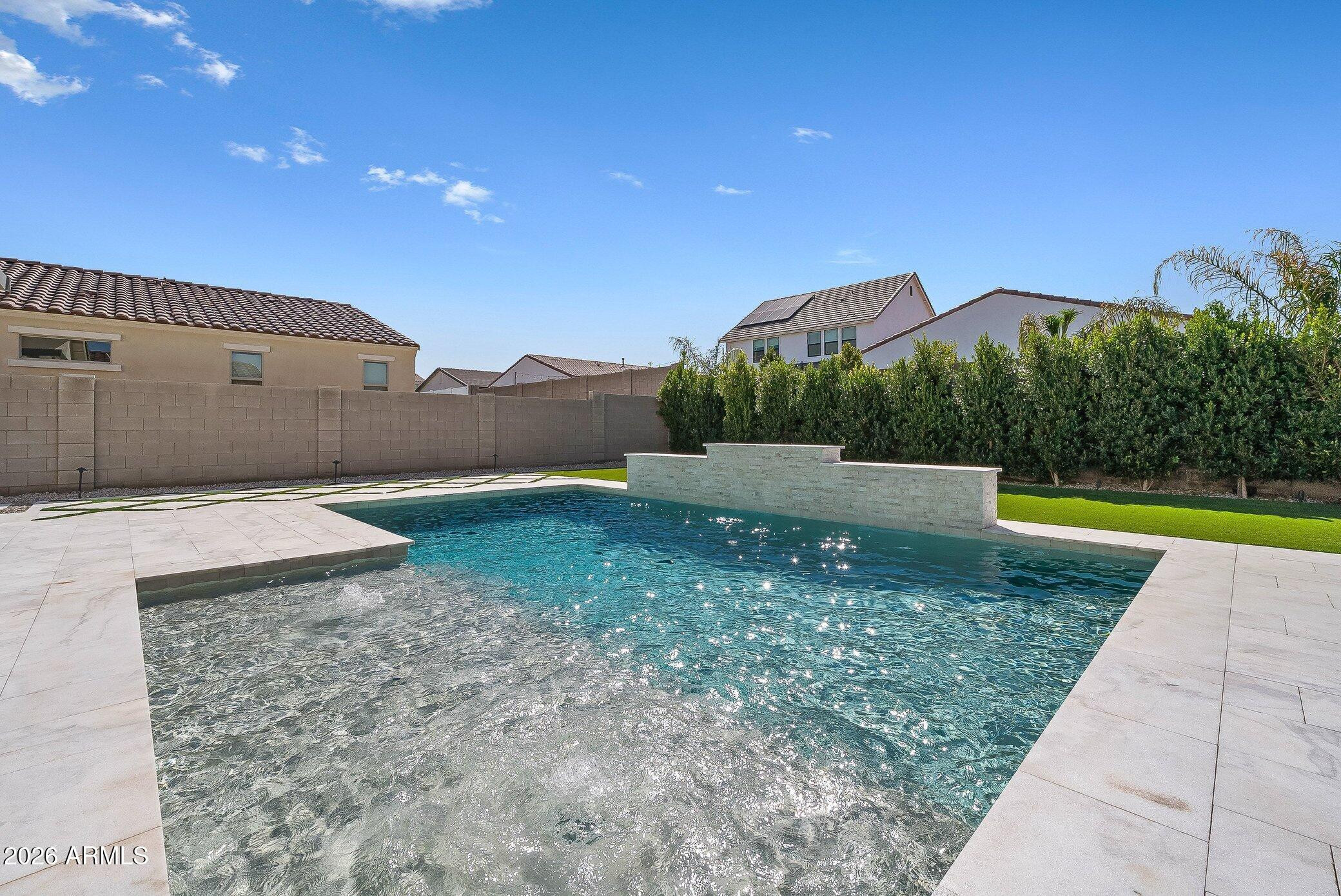35032 North Barrel Road Queen Creek, AZ 85144 - Photo 5 of 37 a view of a yard with a swimming pool