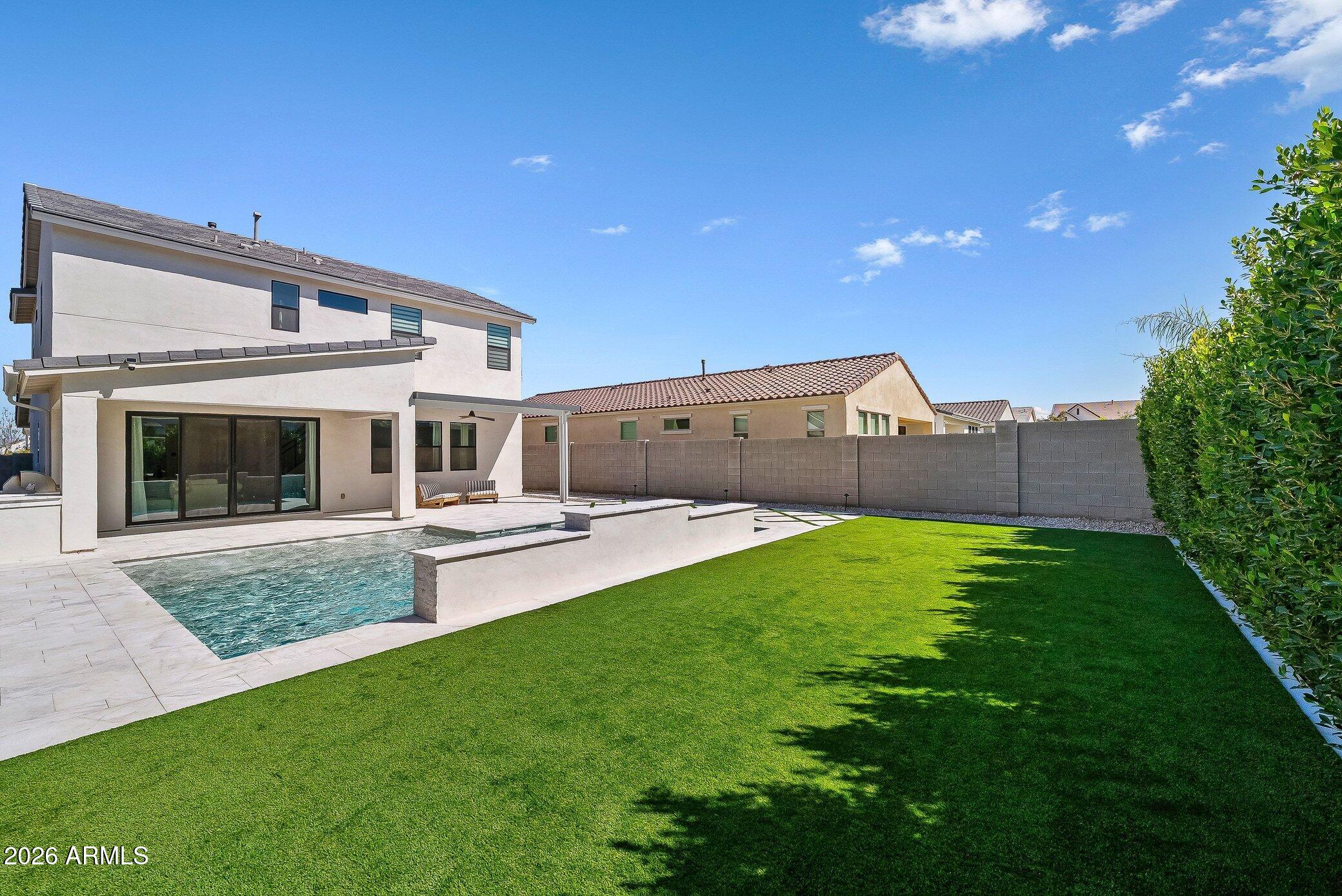 35032 North Barrel Road Queen Creek, AZ 85144 - Photo 5 of 40 a view of a house with backyard and porch