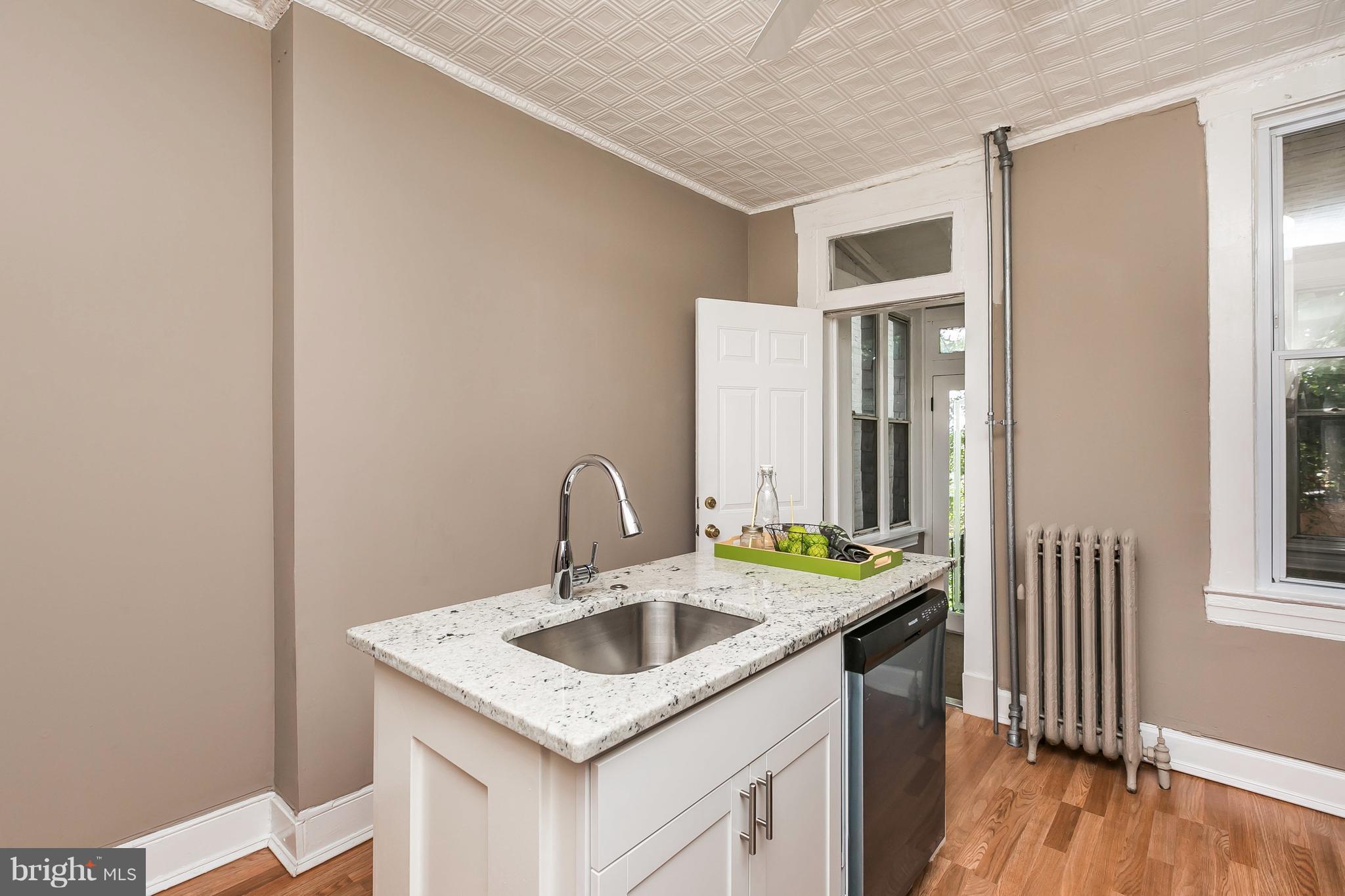 4024 Roland Avenue Baltimore, MD 21211 - Photo 12 of 28 New Kitchen with SS Appliances, Granite and Island