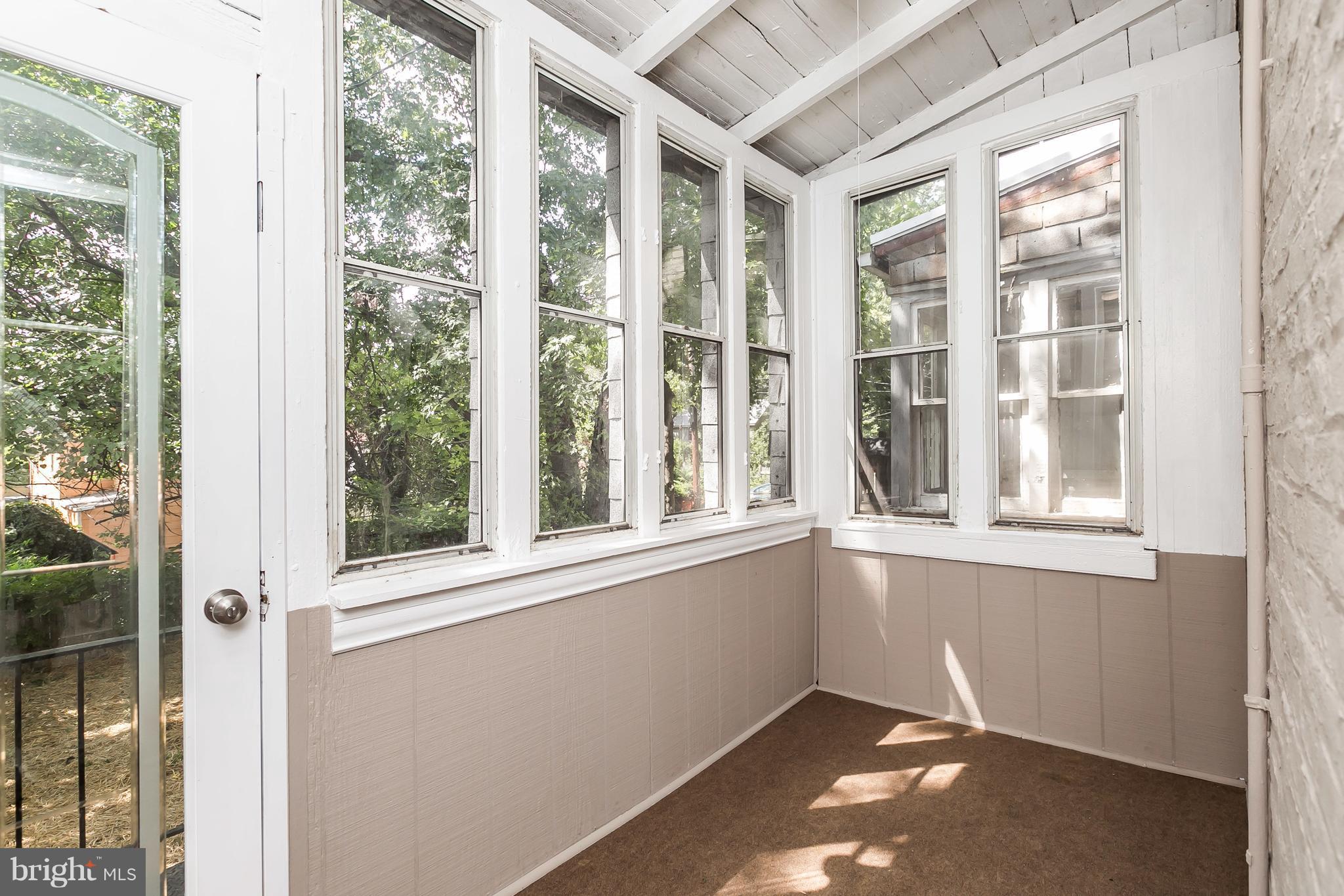 4024 Roland Avenue Baltimore, MD 21211 - Photo 13 of 28 Enclosed Porch off the kitchen
