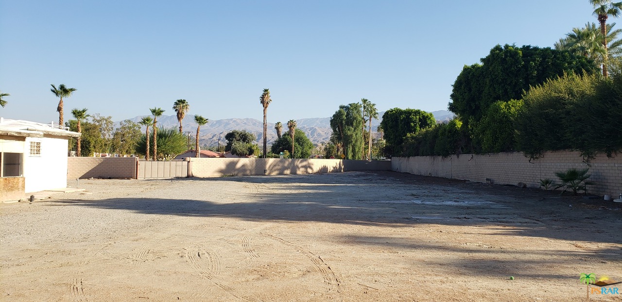 0 Joshua Road Rancho Mirage, CA 92270 - Photo 9 of 9 a view of a road with a building in the background