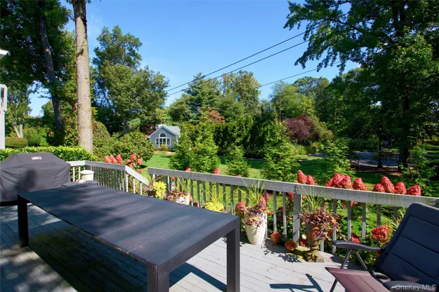 a view of a chairs and tables in the balcony