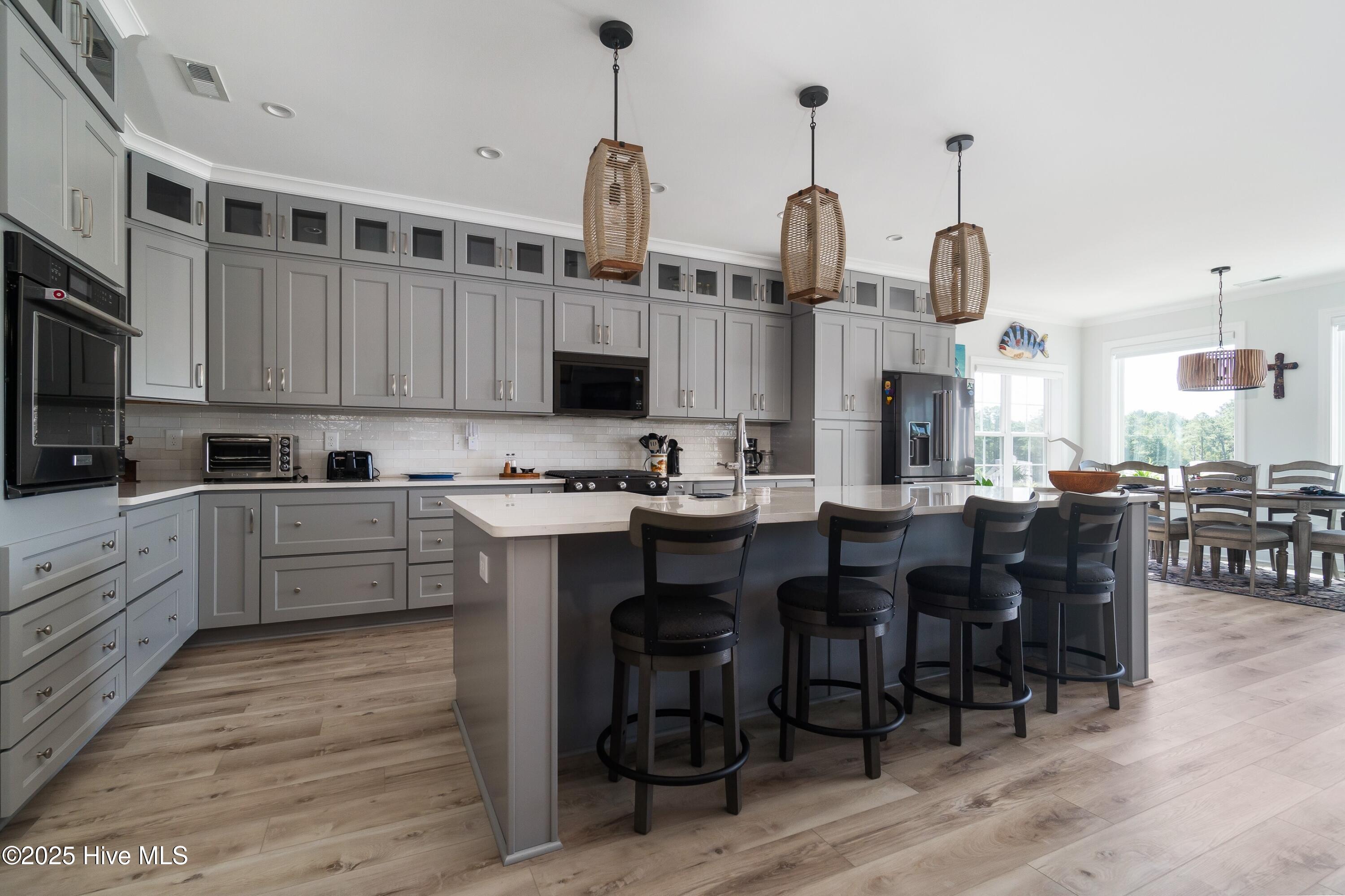 609 Bell Point Road Merritt, NC 28556 - Photo 13 of 60 013_Kitchen counter seating