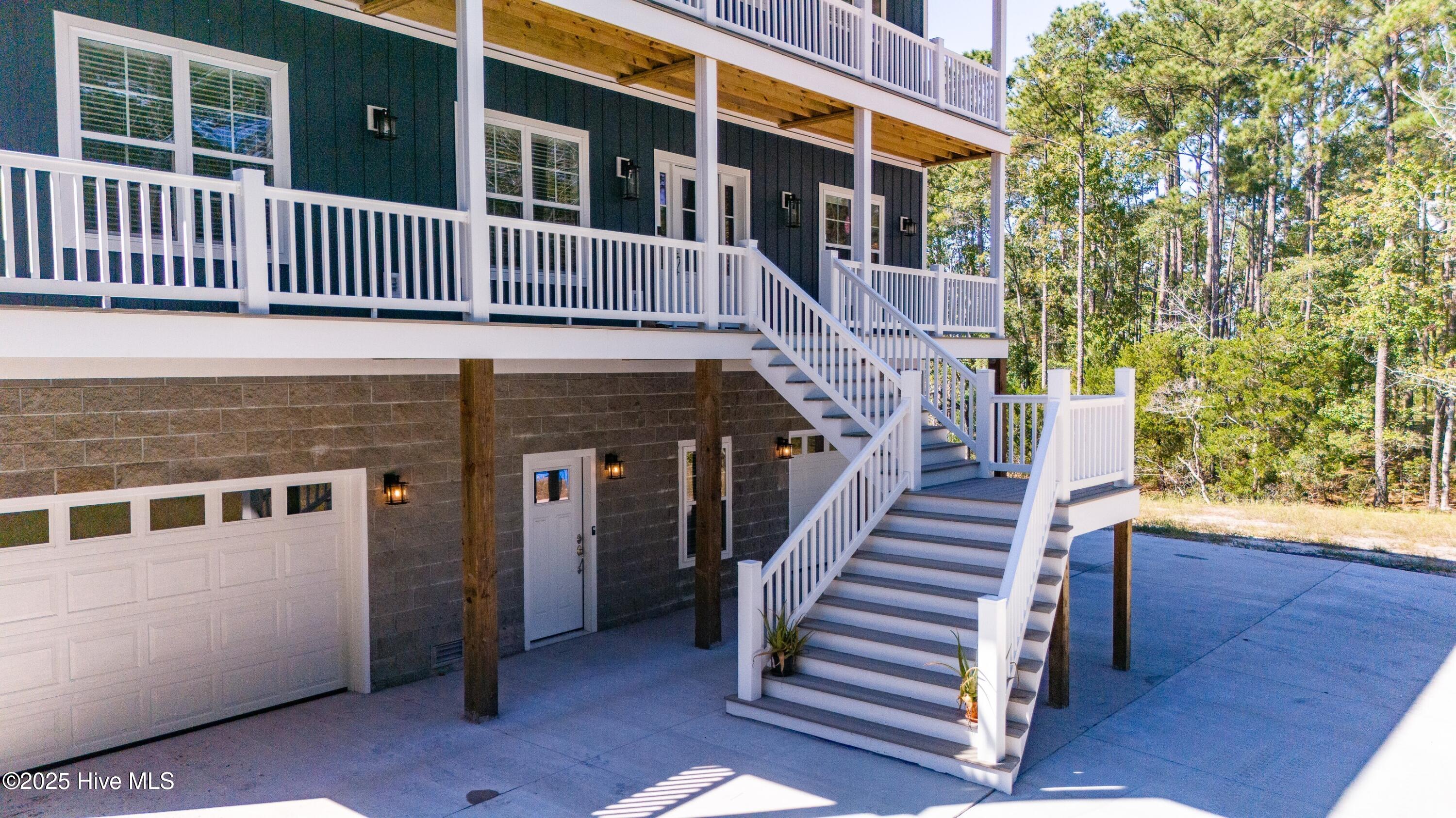 609 Bell Point Road Merritt, NC 28556 - Photo 3 of 60 003_Front Entrance Stairs