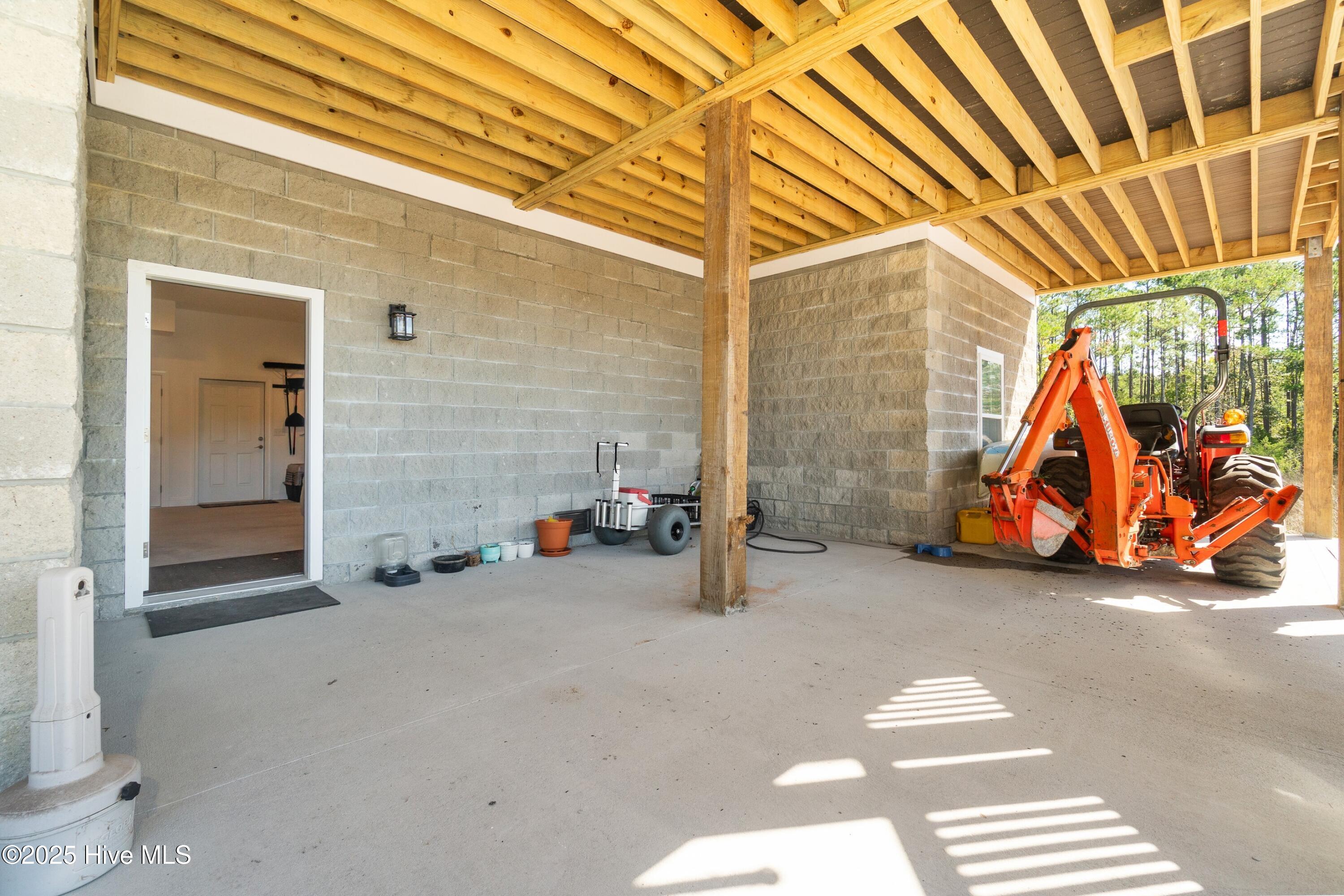 609 Bell Point Road Merritt, NC 28556 - Photo 52 of 60 052_Grnd level Walk out