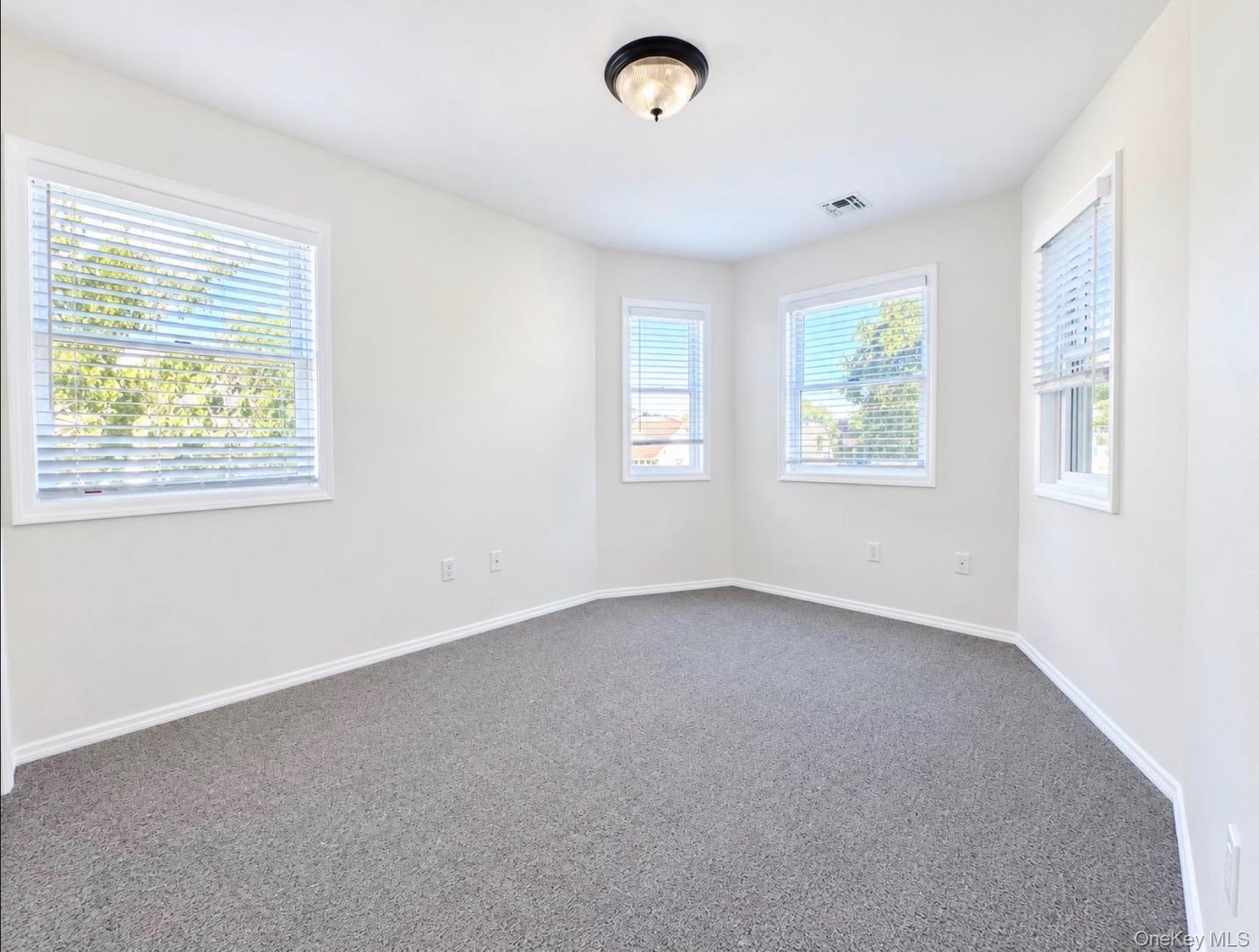 21 Marwood Road North, Unit RIGHT SIDE Port Washington, NY 11050 - Photo 12 of 20 Second Large Bedroom with Bay Windows