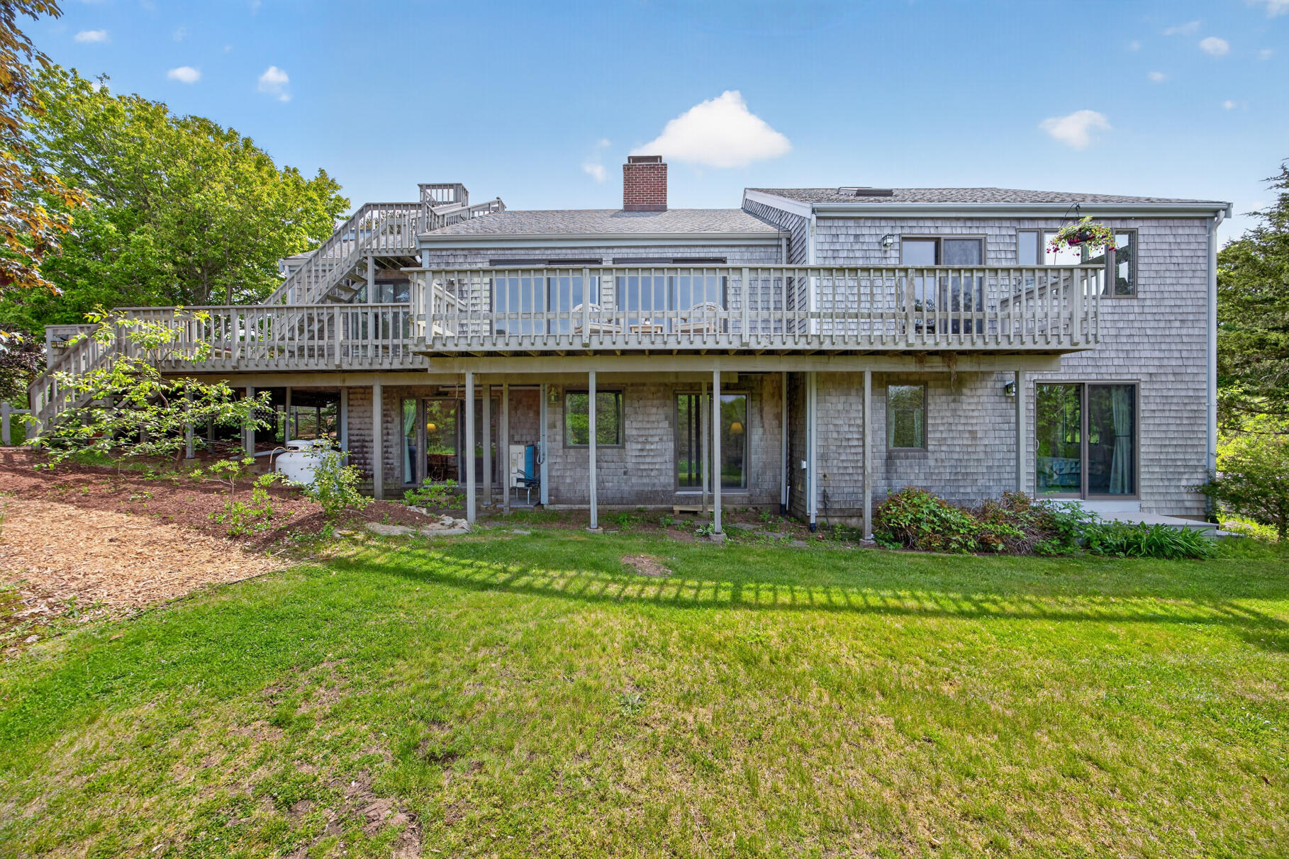17 Gosnold Road Orleans, MA 02653 - Photo 12 of 52 Rear with Spacoius lawn