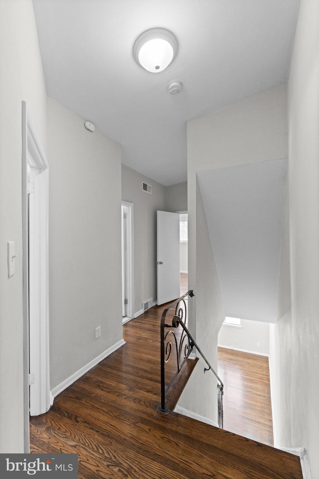 205 Juniper Road, Unit 288 Havertown, PA 19083 - Photo 21 of 28 Inviting hallway with warm wood floors.