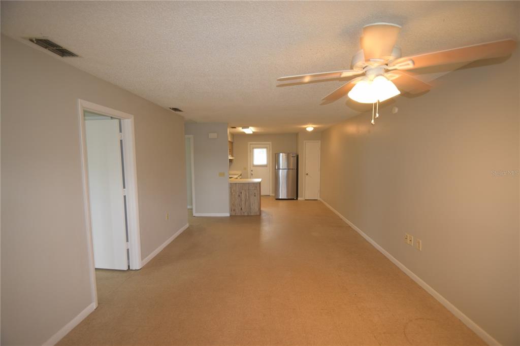 117 Leelon Road, Unit 117 Lakeland, FL 33809 - Photo 2 of 13 a view of a livingroom and a chandelier fan