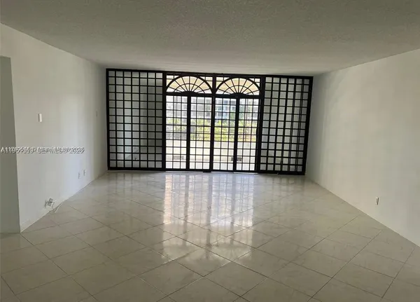 view of an empty room with a window