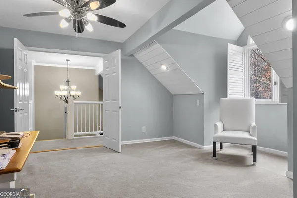 a view of an empty room and window