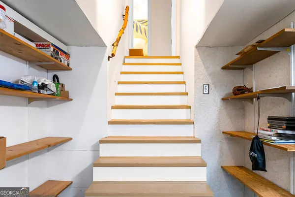a room with storage and a table