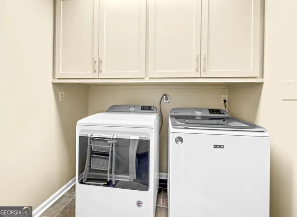 a aerial view of a house with a yard