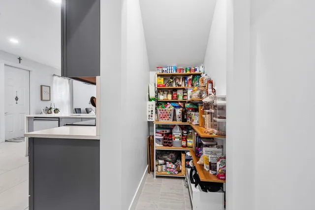 a storage room with washer and dryer