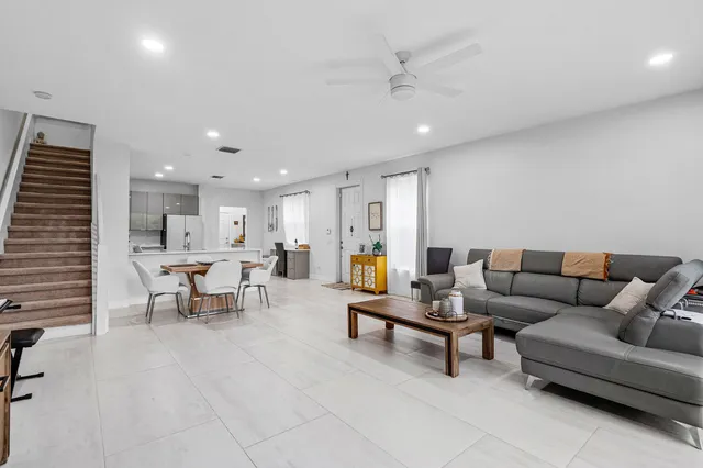 a living room with furniture and a table