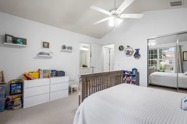 a bedroom with furniture and a couch