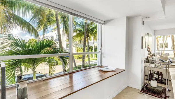 a view of a room with window and living room