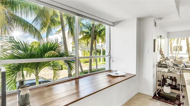 a view of a room with window and living room