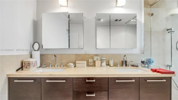 a room with a sink and cabinets