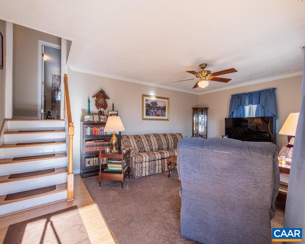 3483 West River Road Scottsville, VA 24590 - Photo 6 of 33 a living room with furniture and a flat screen tv